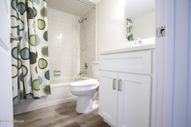 LUXURY IN GATED GOLF COMMUNITY - 3BR/2BA END UNIT | 128-B Golden on The Club At Pelican Bay - North Course in Florida - for sale on GolfHomes.com, golf home, golf lot