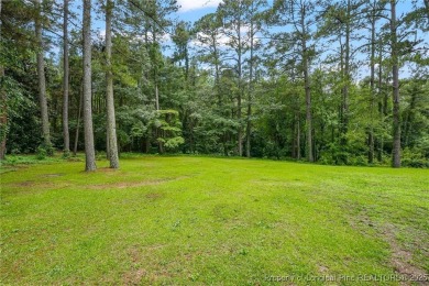 Welcome to this Gray's Creek tri-level cutie! On the main floor on Cypress Lakes Golf Course in North Carolina - for sale on GolfHomes.com, golf home, golf lot