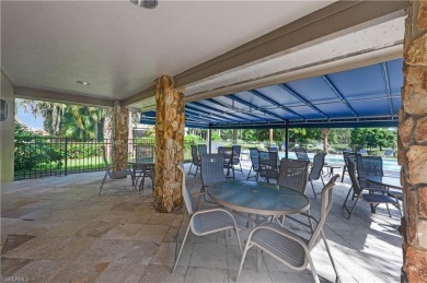 Wake up to sweeping golf and lake views in this beautifully on  in Florida - for sale on GolfHomes.com, golf home, golf lot
