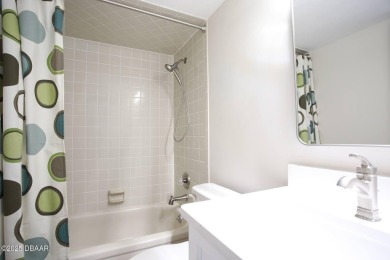 LUXURY IN GATED GOLF COMMUNITY - 3BR/2BA END UNIT | 128-B Golden on The Club At Pelican Bay - North Course in Florida - for sale on GolfHomes.com, golf home, golf lot