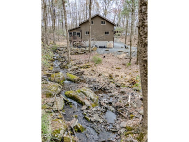 Bring your golf clubs to this  beautiful 4 bedroom 2 bathroom on Paupack Hills Golf and Country Club in Pennsylvania - for sale on GolfHomes.com, golf home, golf lot