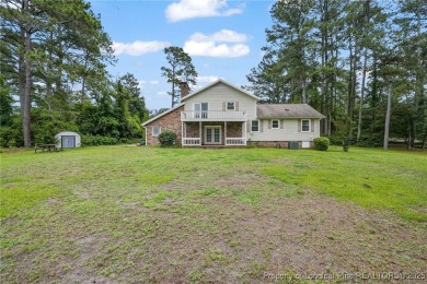Welcome to this Gray's Creek tri-level cutie! On the main floor on Cypress Lakes Golf Course in North Carolina - for sale on GolfHomes.com, golf home, golf lot