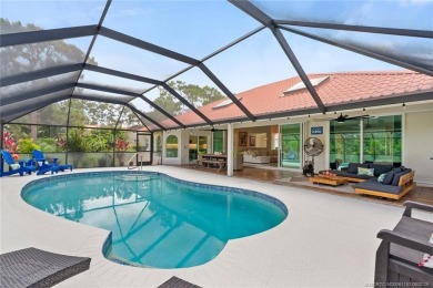This 3BD, 2.5BA CBS pool home in Palm City is anything but on Evergreen Club in Florida - for sale on GolfHomes.com, golf home, golf lot