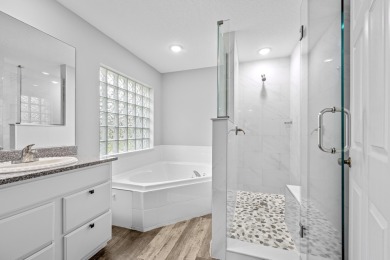 Don't miss your chance to own a 5 bedroom 3.5 bath in the HIGHLY on Champions Club at Summerfield in Florida - for sale on GolfHomes.com, golf home, golf lot