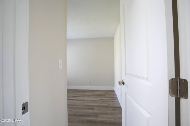LUXURY IN GATED GOLF COMMUNITY - 3BR/2BA END UNIT | 128-B Golden on The Club At Pelican Bay - North Course in Florida - for sale on GolfHomes.com, golf home, golf lot