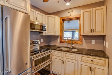 Bring your golf clubs to this  beautiful 4 bedroom 2 bathroom on Paupack Hills Golf and Country Club in Pennsylvania - for sale on GolfHomes.com, golf home, golf lot