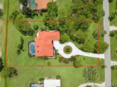 This 3BD, 2.5BA CBS pool home in Palm City is anything but on Evergreen Club in Florida - for sale on GolfHomes.com, golf home, golf lot