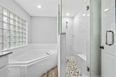 Don't miss your chance to own a 5 bedroom 3.5 bath in the HIGHLY on Champions Club at Summerfield in Florida - for sale on GolfHomes.com, golf home, golf lot