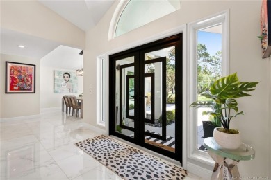 This 3BD, 2.5BA CBS pool home in Palm City is anything but on Evergreen Club in Florida - for sale on GolfHomes.com, golf home, golf lot