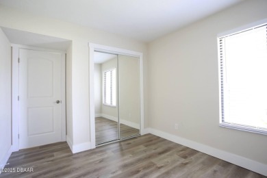 LUXURY IN GATED GOLF COMMUNITY - 3BR/2BA END UNIT | 128-B Golden on The Club At Pelican Bay - North Course in Florida - for sale on GolfHomes.com, golf home, golf lot