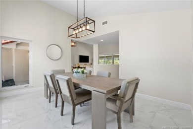 This 3BD, 2.5BA CBS pool home in Palm City is anything but on Evergreen Club in Florida - for sale on GolfHomes.com, golf home, golf lot