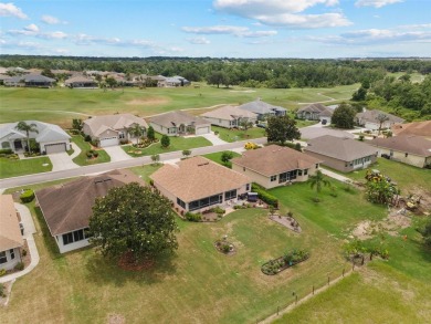 Discover this meticulously maintained 3-bedroom, 2-bathroom home on Huntington Hills Golf and Country Club in Florida - for sale on GolfHomes.com, golf home, golf lot