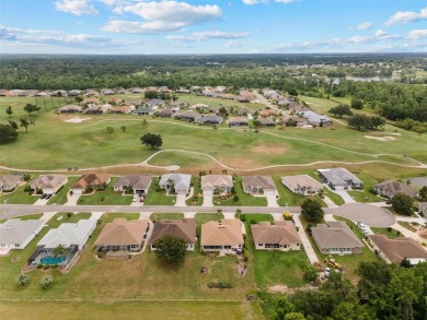 Discover this meticulously maintained 3-bedroom, 2-bathroom home on Huntington Hills Golf and Country Club in Florida - for sale on GolfHomes.com, golf home, golf lot