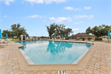 Discover this meticulously maintained 3-bedroom, 2-bathroom home on Huntington Hills Golf and Country Club in Florida - for sale on GolfHomes.com, golf home, golf lot