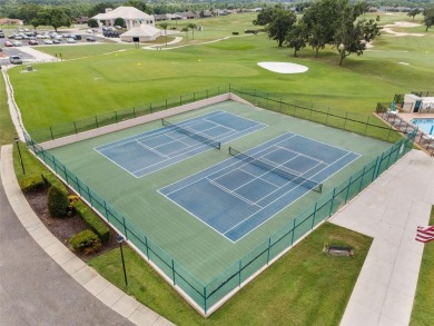 Discover this meticulously maintained 3-bedroom, 2-bathroom home on Huntington Hills Golf and Country Club in Florida - for sale on GolfHomes.com, golf home, golf lot