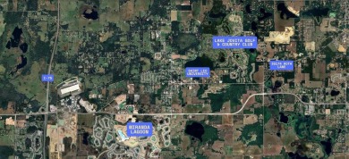 High and Dry, flood zone X!!! Tired of the busy city and hustle on Lake Jovita Golf and Country Club in Florida - for sale on GolfHomes.com, golf home, golf lot