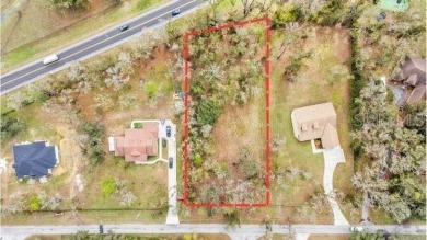 High and Dry, flood zone X!!! Tired of the busy city and hustle on Lake Jovita Golf and Country Club in Florida - for sale on GolfHomes.com, golf home, golf lot