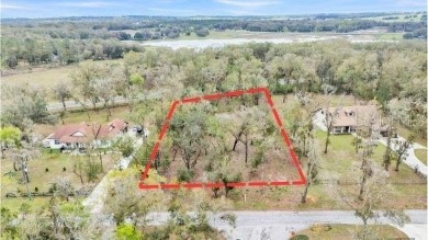 High and Dry, flood zone X!!! Tired of the busy city and hustle on Lake Jovita Golf and Country Club in Florida - for sale on GolfHomes.com, golf home, golf lot