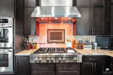 Welcome to this exceptional 5-bedroom, 5-bathroom executive home on Colbert Hills Golf Course in Kansas - for sale on GolfHomes.com, golf home, golf lot