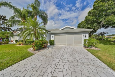 WELCOME TO YOUR MAINTENANCE FREE HOME! This quaint  charming on Falcon Watch Golf Club in Florida - for sale on GolfHomes.com, golf home, golf lot