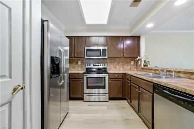 Beautifully updated first-floor condo in sought after Greenbrier on Greenbrier Country Club in Virginia - for sale on GolfHomes.com, golf home, golf lot