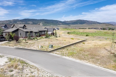 Situated on the 5th fairway of Grand Elk Golf Club, this flat on Grand Elk Ranch and Club in Colorado - for sale on GolfHomes.com, golf home, golf lot