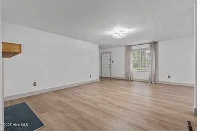 Don't miss this opportunity to own a charming, fully updated on The National Golf Club in North Carolina - for sale on GolfHomes.com, golf home, golf lot