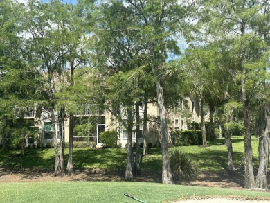 First floor, end unit Abbey (highly coveted!) is light and on Cedar Hammock Golf and Country Club in Florida - for sale on GolfHomes.com, golf home, golf lot