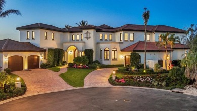 A luxurious coastal retreat at the water's edge on Longboat Key on Links on Longboat Golf Club in Florida - for sale on GolfHomes.com, golf home, golf lot
