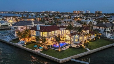 A luxurious coastal retreat at the water's edge on Longboat Key on Links on Longboat Golf Club in Florida - for sale on GolfHomes.com, golf home, golf lot