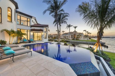 A luxurious coastal retreat at the water's edge on Longboat Key on Links on Longboat Golf Club in Florida - for sale on GolfHomes.com, golf home, golf lot