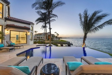 A luxurious coastal retreat at the water's edge on Longboat Key on Links on Longboat Golf Club in Florida - for sale on GolfHomes.com, golf home, golf lot