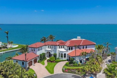A luxurious coastal retreat at the water's edge on Longboat Key on Links on Longboat Golf Club in Florida - for sale on GolfHomes.com, golf home, golf lot