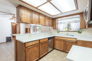Tee up your next chapter with this charming older home adjacent on Lake Shastina Golf Course in California - for sale on GolfHomes.com, golf home, golf lot