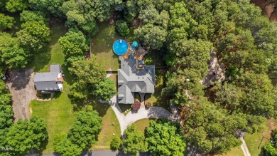 Welcome to this beautiful Craftsman-style home with 2,460 square on Pine Hollow Golf Club in North Carolina - for sale on GolfHomes.com, golf home, golf lot