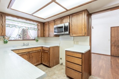 Tee up your next chapter with this charming older home adjacent on Lake Shastina Golf Course in California - for sale on GolfHomes.com, golf home, golf lot