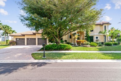 Nestled on a tranquil cul de sac, this 5-bed, 4.5-bath residence on Boca Grove Golf and Tennis in Florida - for sale on GolfHomes.com, golf home, golf lot