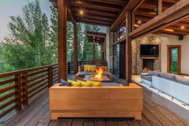 This 9,352-square-foot compound, including both a main residence on Martis Camp Golf Course in California - for sale on GolfHomes.com, golf home, golf lot