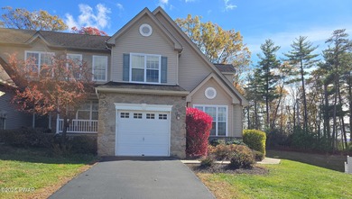 Located in the Country Club of the Poconos, 1712 Big Ridge Drive on Country Club of the Poconos Golf Course in Pennsylvania - for sale on GolfHomes.com, golf home, golf lot