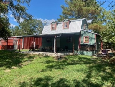 Outstanding view of a 80 plus acre private lake . Charming 3 bed on Clarksville Country Club in Texas - for sale on GolfHomes.com, golf home, golf lot