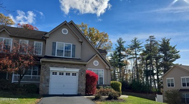 Located in the Country Club of the Poconos, 1712 Big Ridge Drive on Country Club of the Poconos Golf Course in Pennsylvania - for sale on GolfHomes.com, golf home, golf lot