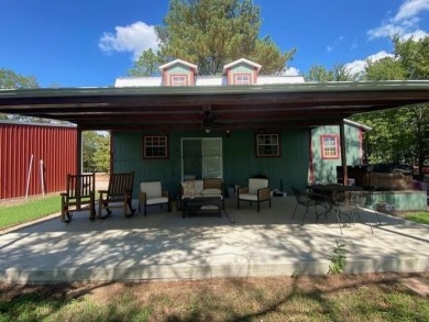 Outstanding view of a 80 plus acre private lake . Charming 3 bed on Clarksville Country Club in Texas - for sale on GolfHomes.com, golf home, golf lot