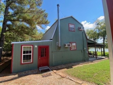 Outstanding view of a 80 plus acre private lake . Charming 3 bed on Clarksville Country Club in Texas - for sale on GolfHomes.com, golf home, golf lot