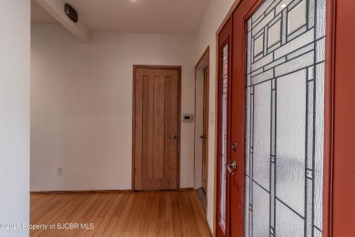 GOLF COURSE LIVING! This affordable Country Club Townhome offers on San Juan Country Club in New Mexico - for sale on GolfHomes.com, golf home, golf lot