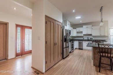 GOLF COURSE LIVING! This affordable Country Club Townhome offers on San Juan Country Club in New Mexico - for sale on GolfHomes.com, golf home, golf lot