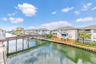 This lovely condo is right on the canal and will be great for on Sandpiper Cove Golf Course in Florida - for sale on GolfHomes.com, golf home, golf lot