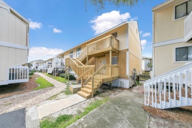 This lovely condo is right on the canal and will be great for on Sandpiper Cove Golf Course in Florida - for sale on GolfHomes.com, golf home, golf lot