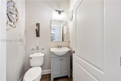 Luxurious townhome with stunning lagoon views overlooking the on Hampton Pointe Golf Course in South Carolina - for sale on GolfHomes.com, golf home, golf lot