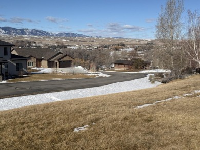 Set in a picturesque location, this lot offers elevated views of on The Powder Horn Golf Club - Mountain in Wyoming - for sale on GolfHomes.com, golf home, golf lot