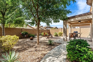 This charming home is so lovely and updated in all the right on Poston Butte Golf Club in Arizona - for sale on GolfHomes.com, golf home, golf lot